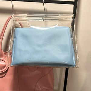 Clear PVC bag with pastel blue insert. Brand new VINTAGE 2000